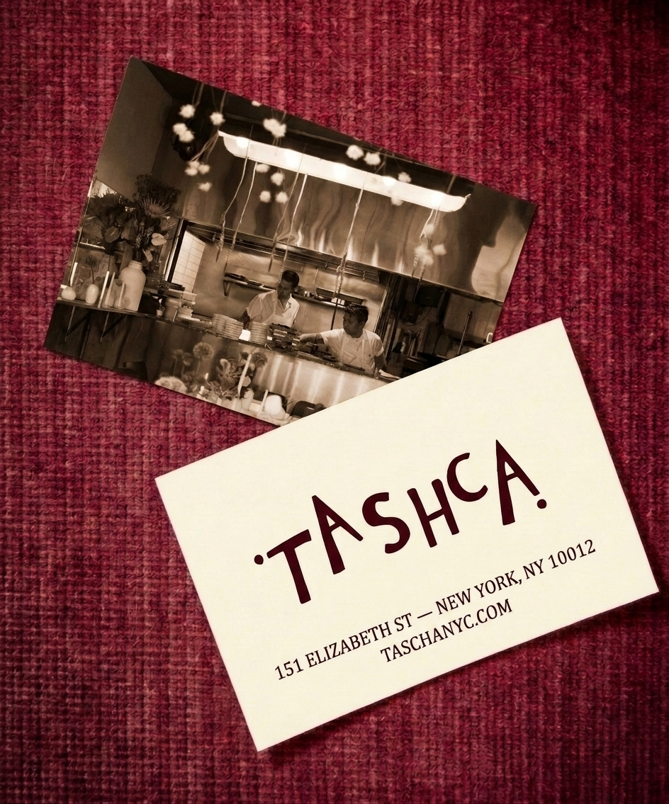 TASHCA gift card and kitchen photograph on deep red linen